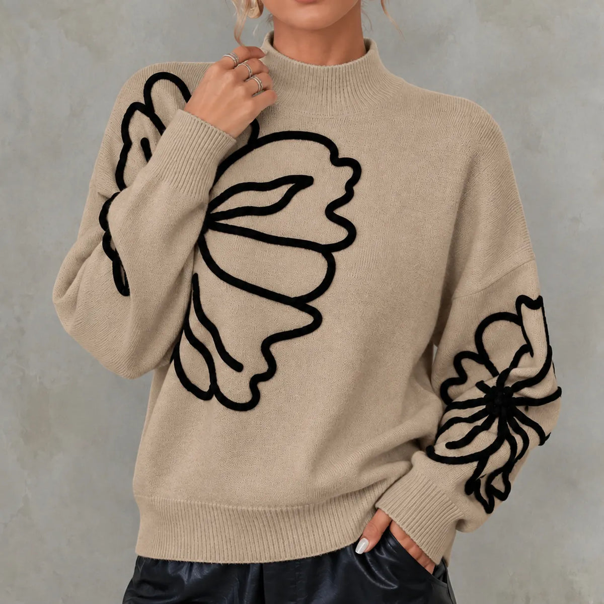 Elegant Long-sleeved Knit Top With A High Neck And 3d Floral Details