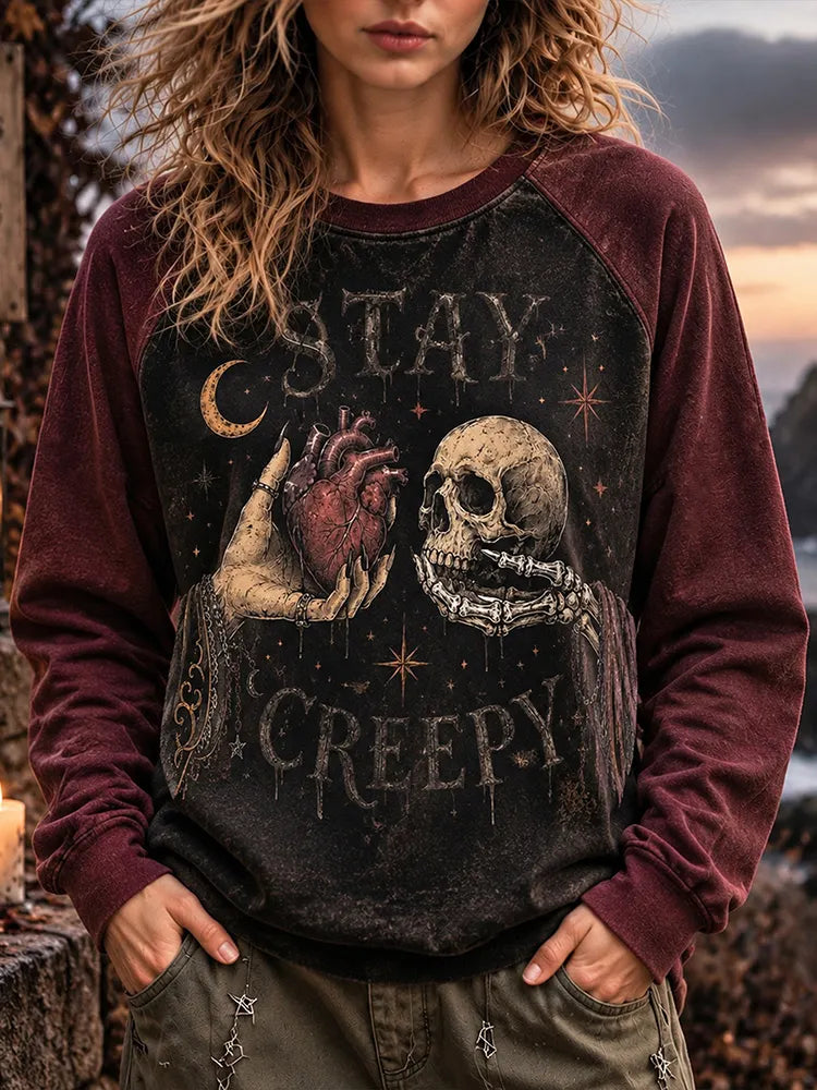 Vintage Distressed Stay Creepy Skeleton Hand Anatomical Heart Raglan Sweatshirt