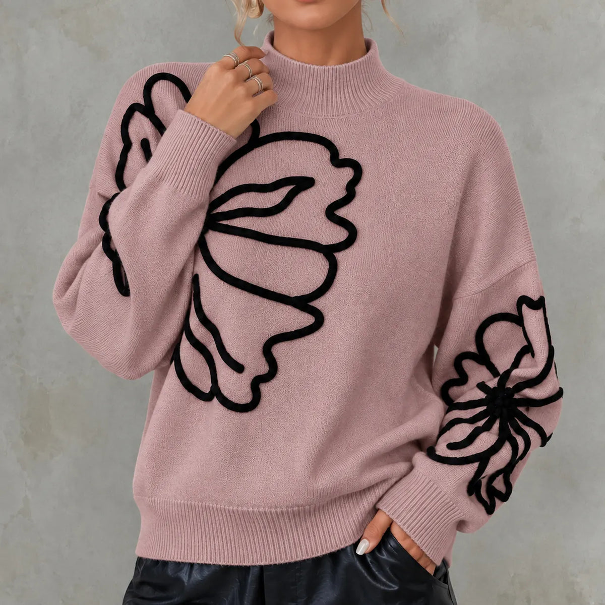 Elegant Long-sleeved Knit Top With A High Neck And 3d Floral Details